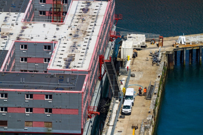 PORTLAND, ENGLAND JUL 20 2023: Detail of Bibby Stockholm barge from above docked on land after arriving the day before. Being prepared to house 500