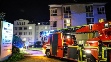 Injured in hospital after room fire