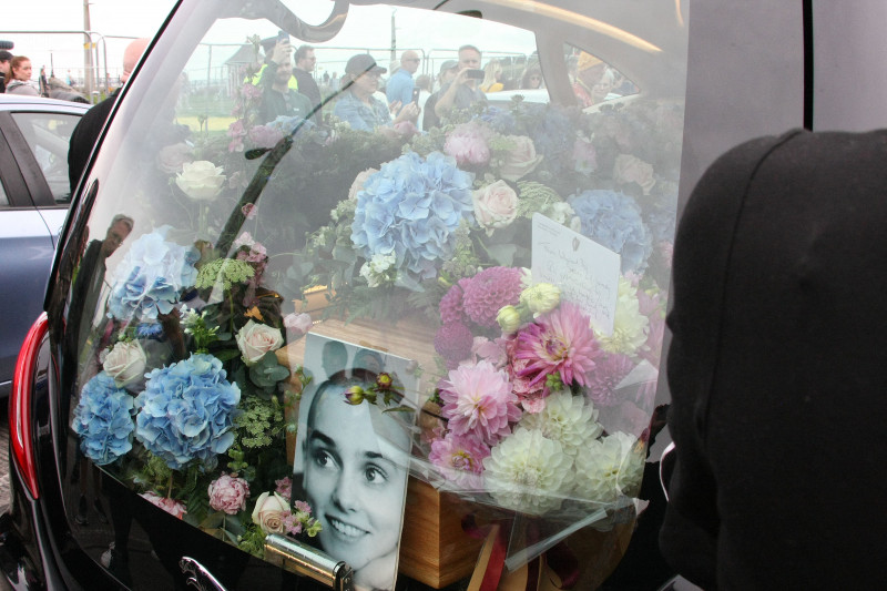 Sinead O'Connor is laid to rest as fans line streets of her home town of Bray
