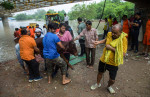 Flood in New Delhi, India In the Face of Adversity: Local residents demonstrate remarkable unity as they join forces wit