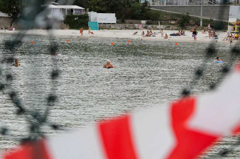 Vacationers Enjoy The Beach - Odesa