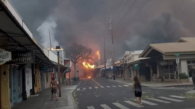 People look on in horror as wildfires rage in Lahaina killing dozens