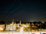 Sheerness, Kent, UK. 13th Aug, 2022. UK Weather: plane and star trails seen in the night sky above Sheerness, Kent during the annual Perseids meteor shower. Credit: James Bell/Alamy Live News