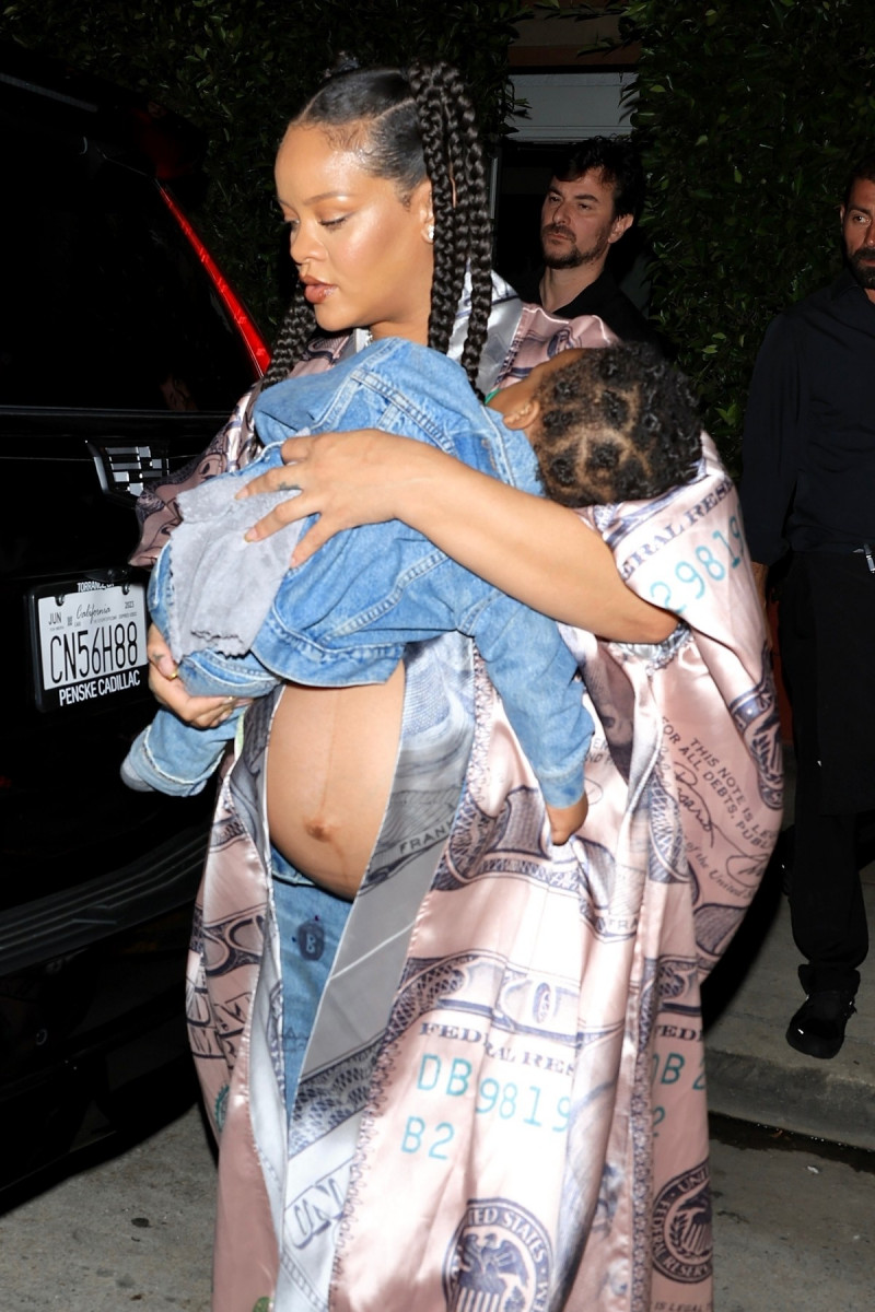 *EXCLUSIVE* Pregnant Rihanna steps out to late night dinner with her baby boy RZA in her arms **WEB MUST CALL FOR PRICING**