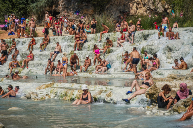 Italy summer heatwave, Saturnia, Tuscany, Italy - 21 Aug 2023