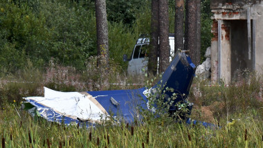The wreckage of a plane is seen at the crash site near the village of Kuzhenkino, Tver