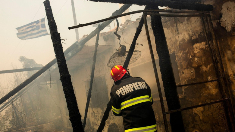 Gennadi, Greece. 24th July, 2023. Romanian firefighters try to extinguish a fire that broke out in a house near the village of Gennadi. Forest fires rage in Rhodes and other parts of Greece. Credit: Socrates Baltagiannis/dpa/Alamy Live News