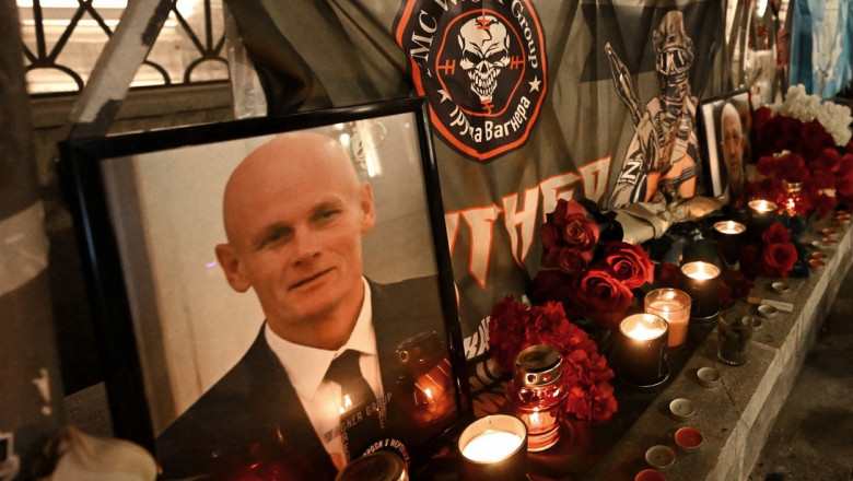 portrait of Dmitry Utkin, a shadowy figure who managed Wagner's operations and allegedly served in Russian military intelligence, is seen at the makeshift memorial in Moscow