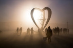 A sand storm obscures the sky in the desert during the annual Burning Man festival September 5, 2015 in Black Rock City, Nevada. Burning Man's official art theme this year is "Carnival of Mirrors" and is expected to be attended by 70,000 people for the we