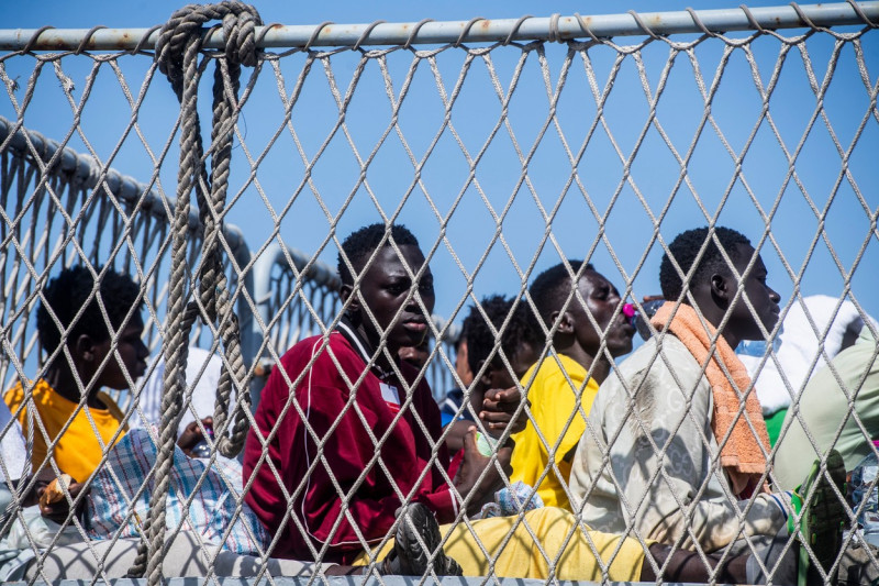 migrants wait to be transferred to Porto Empedocle with the Cassiopea ship of the Navy, Lampedusa, Italy 15 Sempt 2023