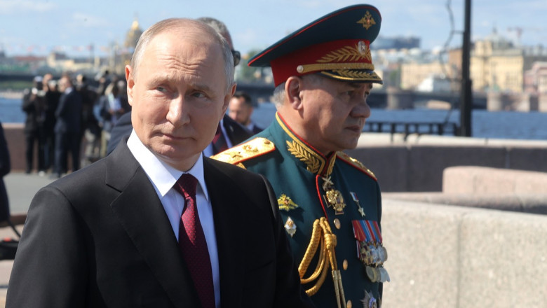 Președintele rus Vladimir Putin și ministrul Apărării, Serghei Șoigu