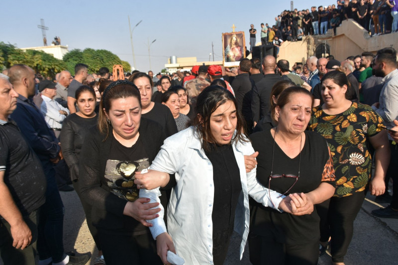 Relatives held funerals after Mosul wedding fire kills at least 93