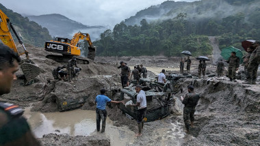 Indian army personnel conduct a search operation for the missing soldiers in north Sikkim, india
