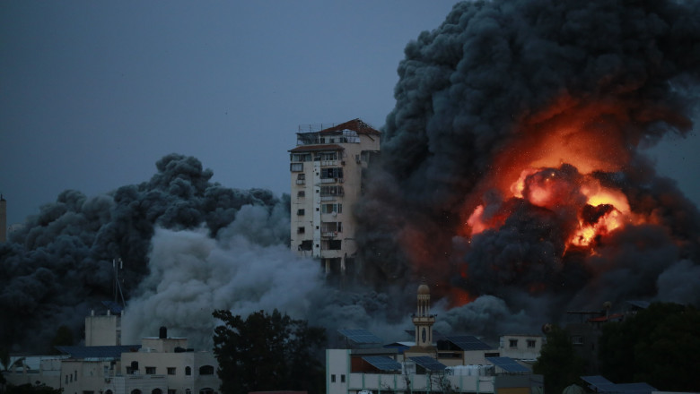 Smoke and flames billow after Israeli forces struck a high-rise tower in Gaza City, Gaza city, Gaza Strip, Palestinian Territory - 07 Oct 2023