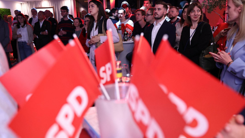 Supporters of the SPD watch a speech by the top candidate at the election party for the state parliamentary elections in Bavaria