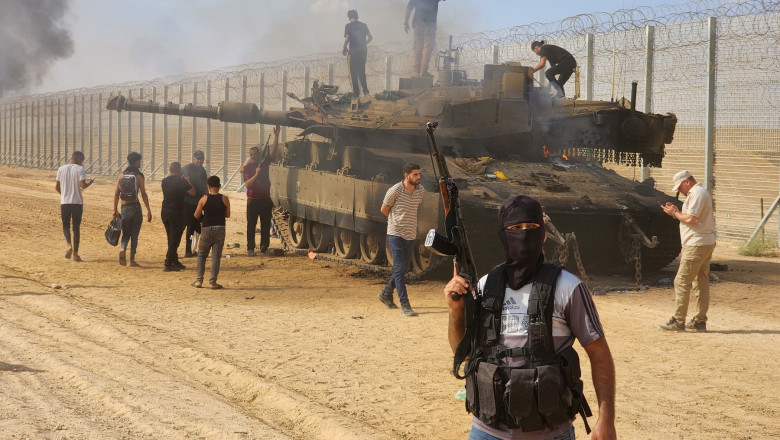 al-Qassam Brigades destroy a tank of Israeli forces in Gaza City