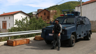 Kosovo police stand guard after the day-long clashes with the armed Serb group in Banjska, Kosovo
