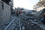 People are seen around destroyed buildings and debris at Dair El_Balah City, after an Israeli airstrikes that has been going on for Nine days in Gaza People are seen around destroyed buildings and debris at Dair El_Balah City, after an Israeli airstrikes