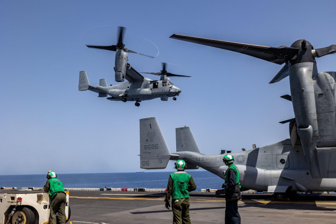 U.S. Marines with the 26th Marine Expeditionary Unit (Special Operations Capable)s (MEU(SOC)), Maritime Special Purpose Force, prepare to depart the Wasp-class amphibious assault ship USS Bataan (LHD 5), Mediterranean Sea, July 28, 2023. The Marines are h