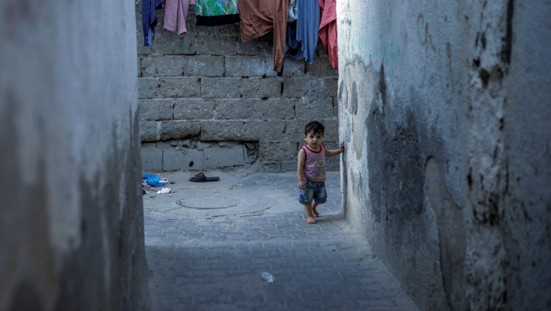 Gaza City, Palestine. 08th Aug, 2023. A Palestinian refugee kid seen looking on in the streets of Jabalia camp, in the northern Gaza Strip. Credit: SOPA Images Limited/Alamy Live News