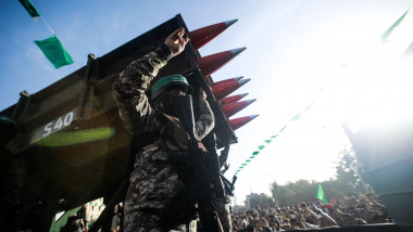 Under the leadership of wanted men of Hamas, Al-Qassam holds a celebration and a military parade to honor the families of the martyrs in northern Gaza