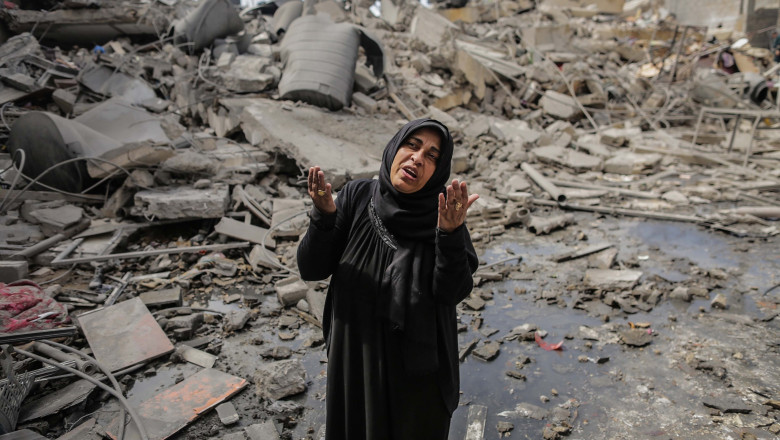 Rubble of building in Gaza city after Israeli airstrikes, Gaza hit by Israel after Hamas denies rocket attack on Tel Aviv.