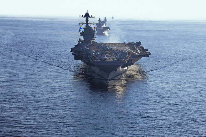 Ionian Sea, United States. 04th Oct, 2023. The U.S. Navy Ford-class aircraft carrier USS Gerald R. Ford leads a formation of ships during operations, October 4, 2023 on the Ionian Sea. Following is the Italian navy aircraft carrier ITS Cavour, Blue Ridge-