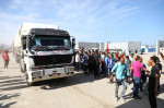 First relief convoy begins to enter Gaza Strip from Egyptian side of Rafah crossing