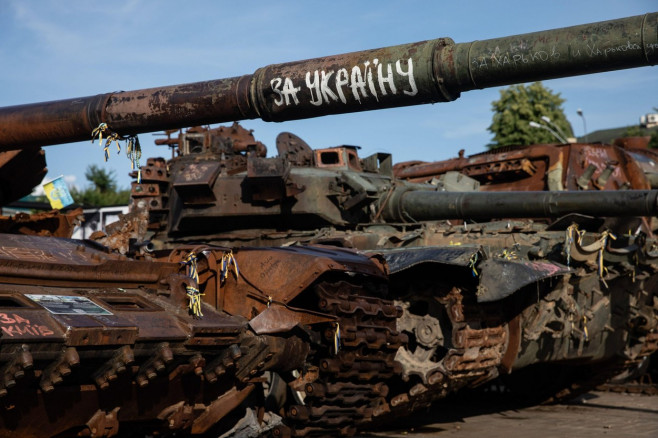 Kyiv, Ukraine. 15th July, 2023. "For Ukraine" word seen written on the barrel of a destroyed Russian tank on display for public at the exhibition of destroyed Russian military vehicles in Kyiv. Credit: SOPA Images Limited/Alamy Live News