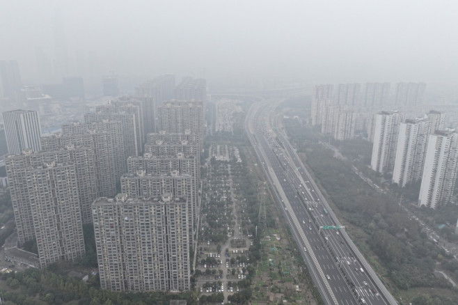 China: Buildings Loom Under Heavy Fog in Nanjing