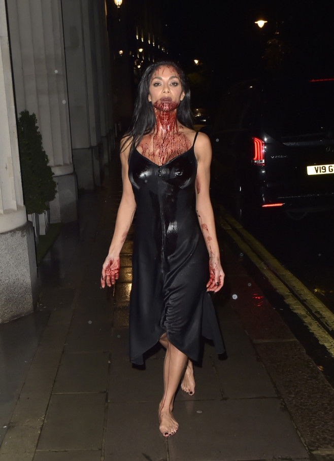 EXCLUSIVE: A Bloodied And Barefoot Nicole Scherzinger Channels Norma Desmond For Halloween 2023