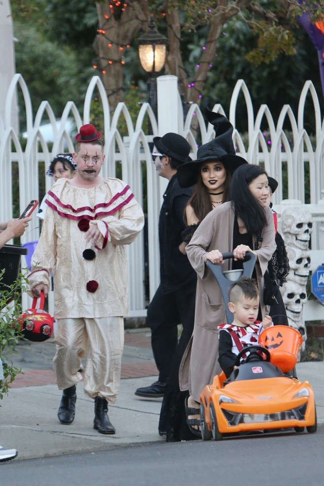 *EXCLUSIVE* Macaulay Culkin and his fiancée Brenda Song were spotted trick-or-treating with their children in L.A