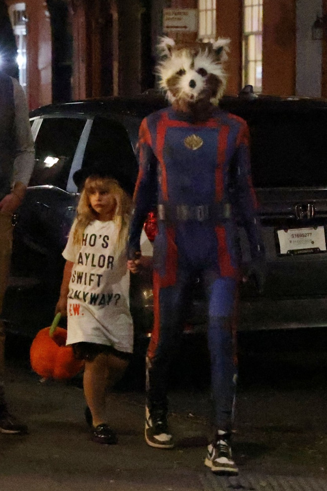 Bradley Cooper and Irina Shayk take their daughter trick or treating dressed as the Rocket from his movie Guardians of the galaxy