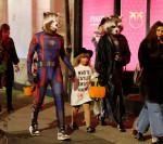 Bradley Cooper and Irina Shayk go trick-or-treating with their daughter Lea in Guardians of the Galaxy-themed costumes