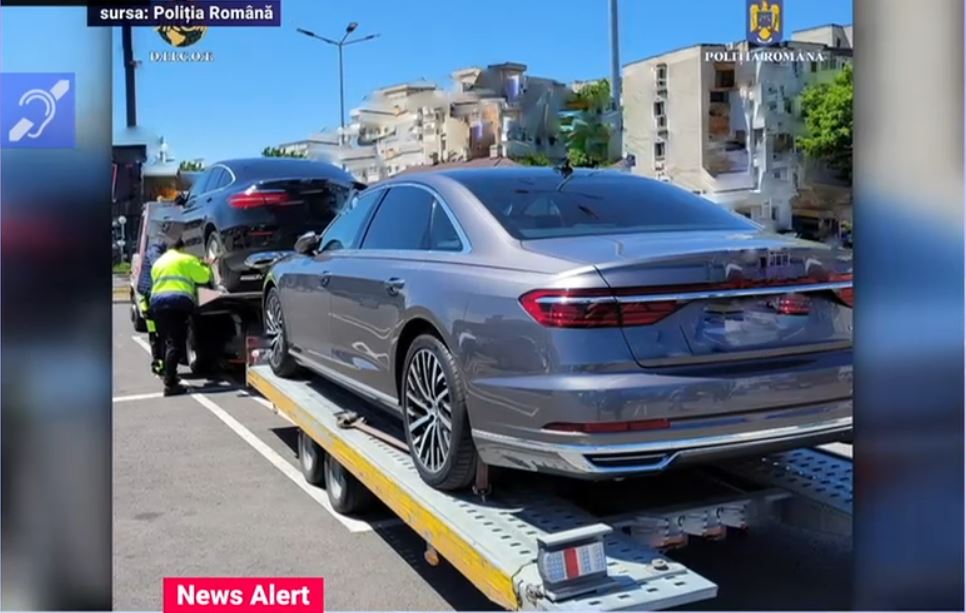 Români păcăliți cu mașini de lux furate: Polițiștii au efectuat percheziții la contrabandiști din București