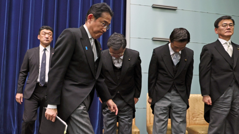 Japanese Prime Minister Fumio Kishida, front, leaves a press conference at the prime minister's office in Tokyo