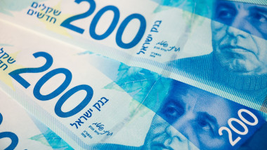 Stack of Israeli money bills of 200 shekel - top view