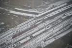 COLOGNE, GERMANY - 4 DECEMBER, 2023: Raiway station Messe Deutz during snowfall in city against sky PUBLICATIONxNOTxINxR