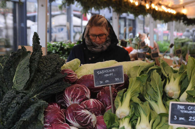 Copenhagen, Denmark /21 November. 2023/Shoppers at farmers market or fruit and vegetable vendor at torvhallerne in danish capital. Torvhallerne. (Photo.Francis Joseph Dean/Dean Pictures)