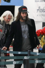 *EXCLUSIVE* Keanu Reeves arrives in Los Angeles with friends