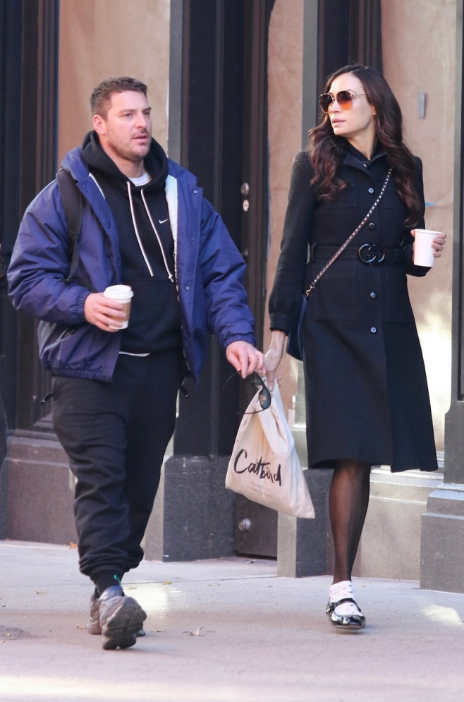 *EXCLUSIVE* Famke Janssen enjoys NYC coffee stroll with Bros star Ryan Faucett