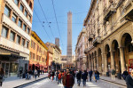 Bologna, Italy. 23 March 2019. A view of Via Rizzoli in the historic center of Bologna, Italy. During the week end there is the stop for all the vehicles so people can walk freely on the streets enjoying a sunny day. Credit: LUIGI rizzo/StockimoNews/Alamy