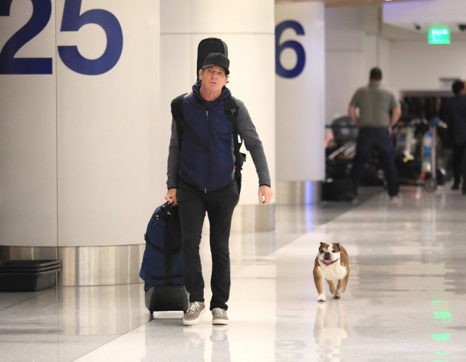 *EXCLUSIVE* Dennis Quaid and his wife spotted at LAX with their beloved Peaches