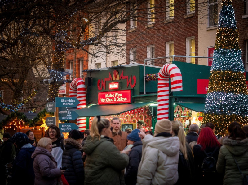 Mulled wine and hot chocolate stall at York St Nicholas Christmas Market 2023, York, North Yorkshire, UK