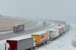 Hundreds of Ukrainian truck drivers stuck in long queues in Slovakia during winter conditions