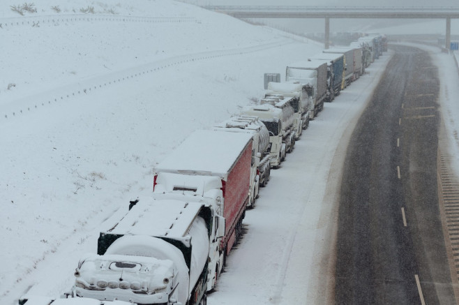 Hundreds of Ukrainian truck drivers stuck in long queues in Slovakia during winter conditions