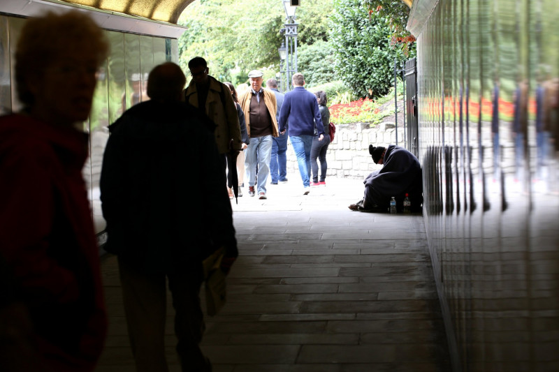 London 2015: A homeless male sat begging in an underpass in central London