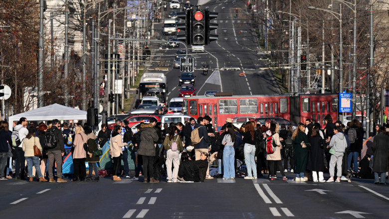 Dozens of Serbian students gather to block a key intersection in Belgrade on December 29, 2023,