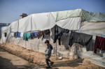 Palestinians, fleeing Israeli attacks, try to survive in makeshift tents in Rafah