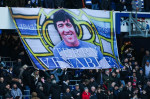 A banner is displayed by Queens Park Rangers fans in memory of Terry Venables during the Sky Bet Championship match at Loftus Road, London. Picture date: Saturday December 9, 2023.